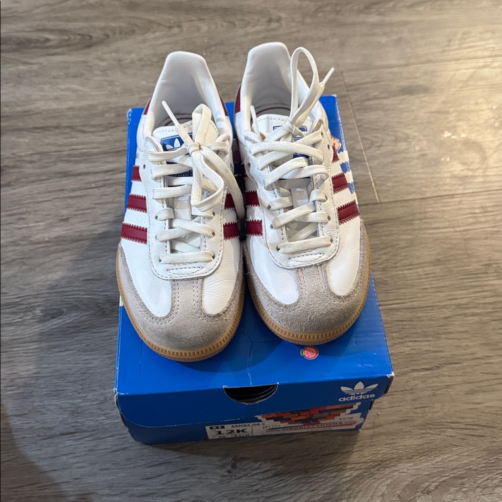 Adidas White and Burgundy Sneakers comes with box only been worn once.